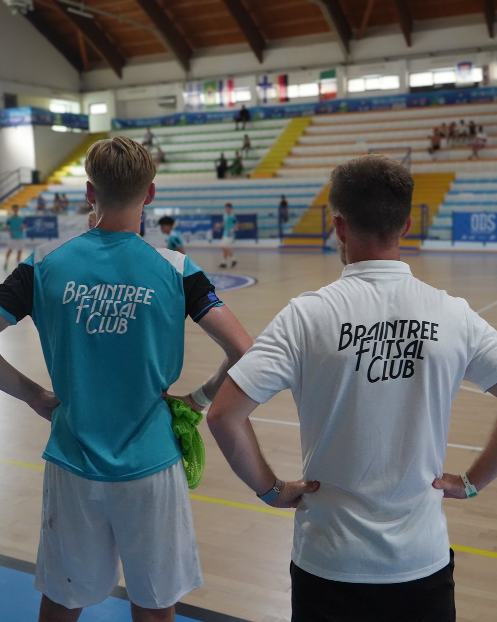 Braintree Futsal Club watching the action from courtside.