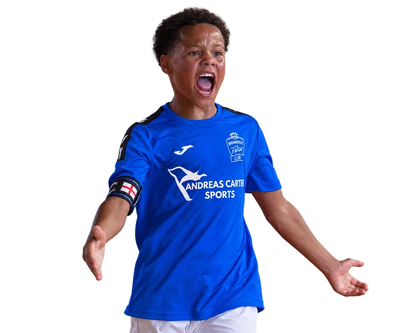 Young Braintree Futsal captain in a blue shirt celebrating with arms outstretched