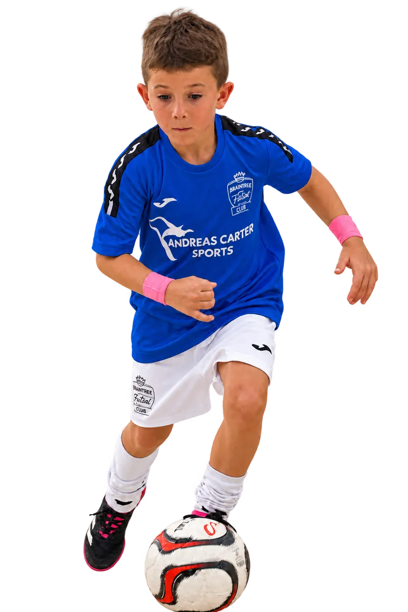 Young Braintree Futsal player in a blue shirt dribbling a ball
